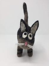 Load image into Gallery viewer, Picture of a black and brown striped felt cat toy standing on a white surface 
