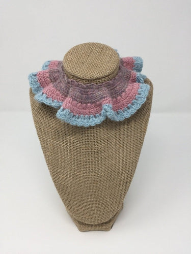 Picture of a pink, blue, and purple Hand Crochet Alpaca Wool Pet Collar around a tan brown bust