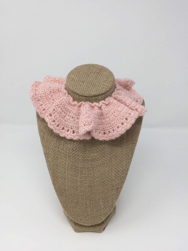 Light pink Hand Crochet Alpaca Wool Pet Collars around a tan brown bust 