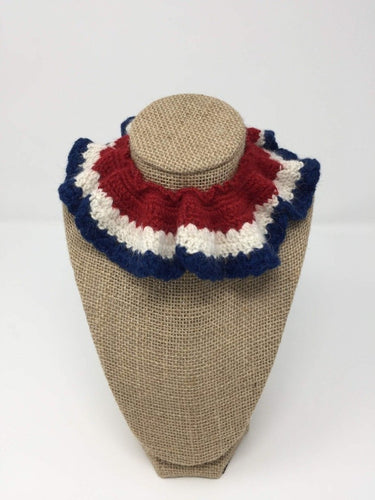 Red, white, and blue Hand Crochet Alpaca Wool Pet Collars around a tan brown bust
