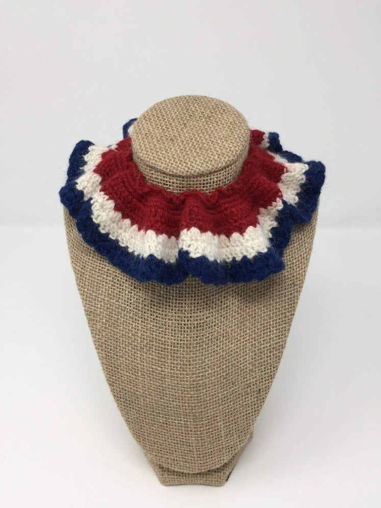 Red, white, and blue Hand Crochet Alpaca Wool Pet Collars around a tan brown bust