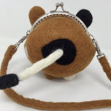 Load image into Gallery viewer, close up picture of the back of a mini brown, black, and white purse with a white tail
